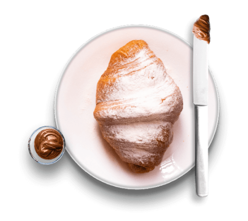 plate with croissant an knife